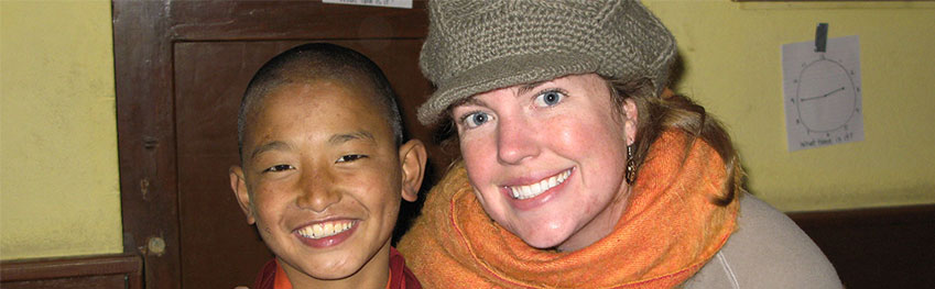 Volunteer with young monk